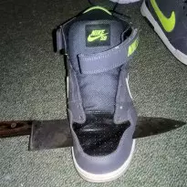 destroying Nike SB hightops and Jordans